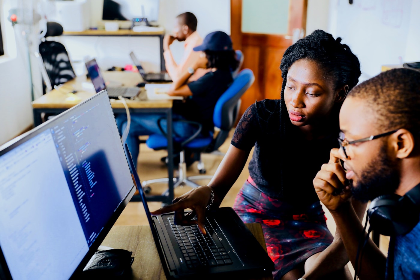 Instructor facilitating an AI finance management session with engaged participants